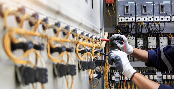 Professional Electrician technician working in Sandy Oaks, TX